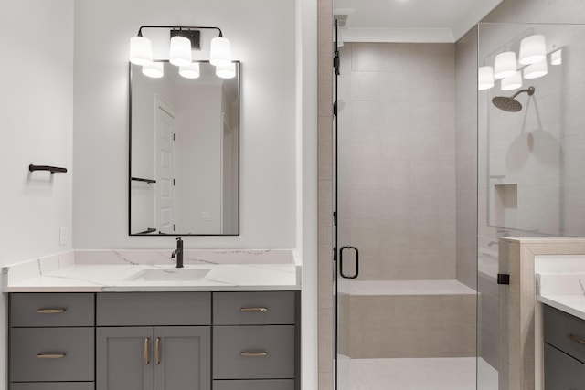 bathroom with vanity and an enclosed shower