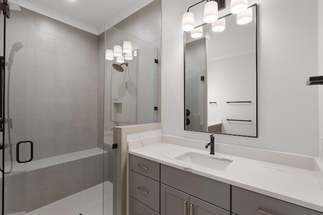 bathroom featuring vanity and a shower with shower door