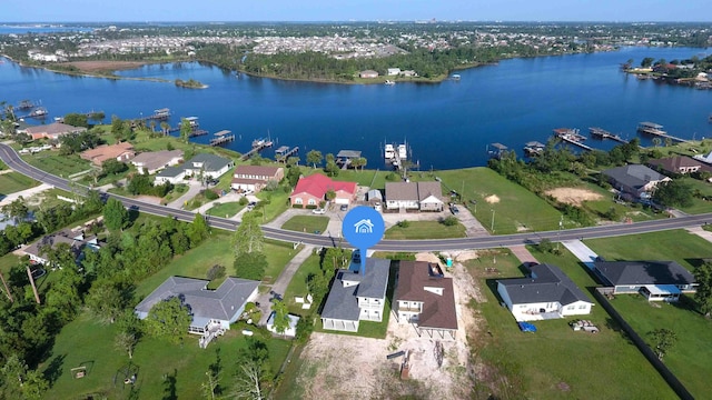 drone / aerial view featuring a water view