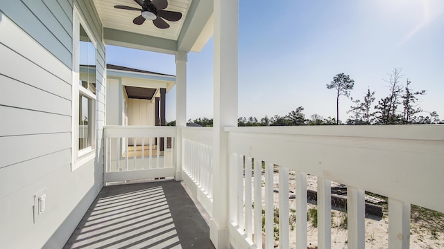 balcony with ceiling fan and covered porch