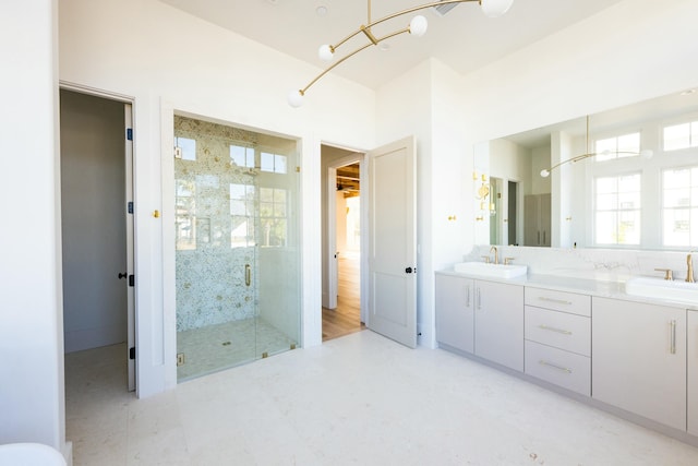 bathroom with vanity and walk in shower