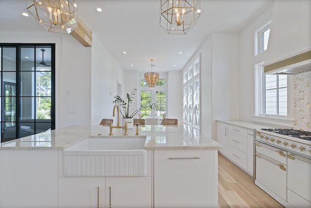 114 Climbing Rose Way, Santa Rosa Beach, FL 32459 - kitchen with a chandelier, plenty of natural light, and recessed lighting