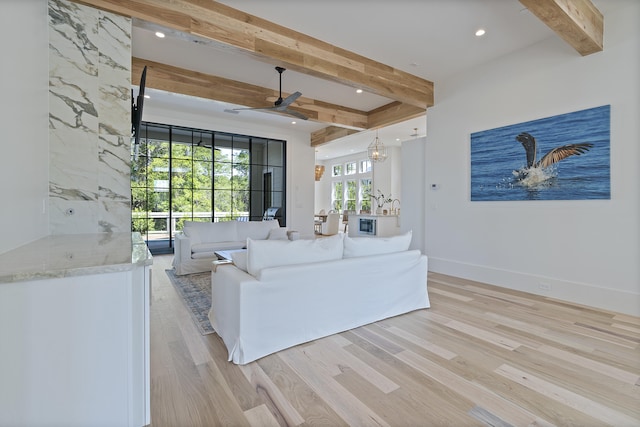 114 Climbing Rose Way, Santa Rosa Beach, FL 32459 - living room with beamed ceiling, ceiling fan, light wood-type flooring, and recessed lighting