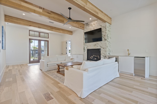114 Climbing Rose Way, Santa Rosa Beach, FL 32459 - living area featuring a premium fireplace, a ceiling fan, light wood-style flooring, beam ceiling, and recessed lighting
