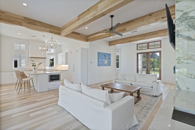 114 Climbing Rose Way, Santa Rosa Beach, FL 32459 - living area with beam ceiling, recessed lighting, healthy amount of natural light, a chandelier, and french doors