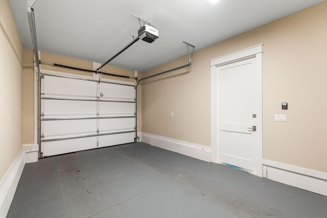 garage featuring a garage door opener