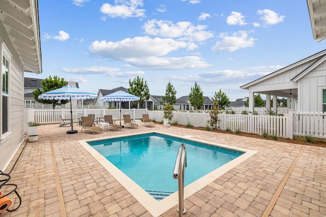 view of pool featuring a patio