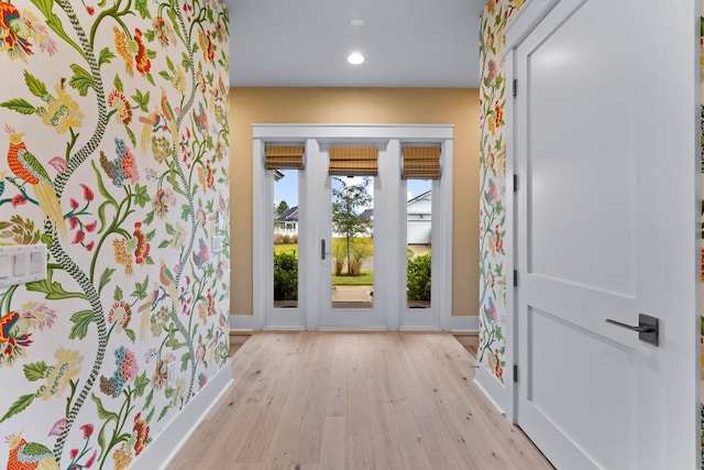 doorway to outside featuring light hardwood / wood-style flooring