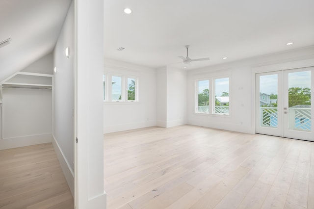 interior space featuring plenty of natural light, light hardwood / wood-style floors, and french doors