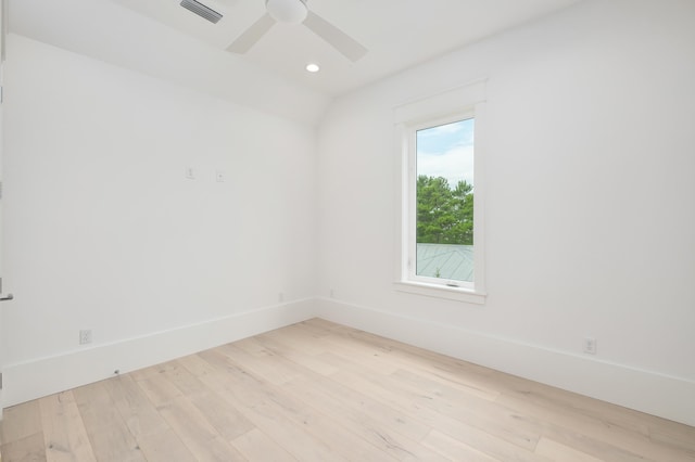 spare room featuring ceiling fan and light hardwood / wood-style flooring