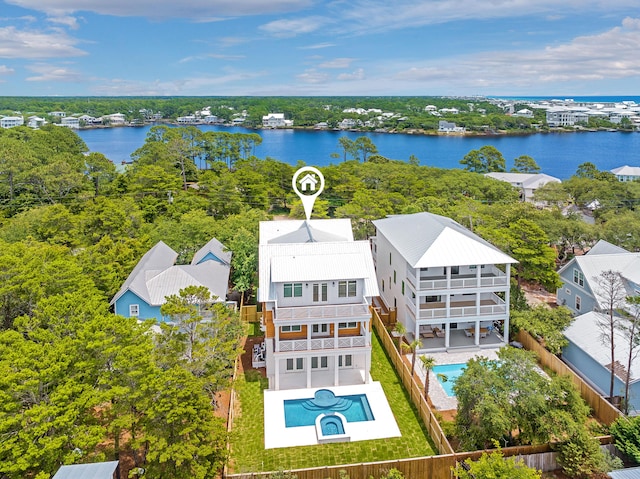 birds eye view of property featuring a water view