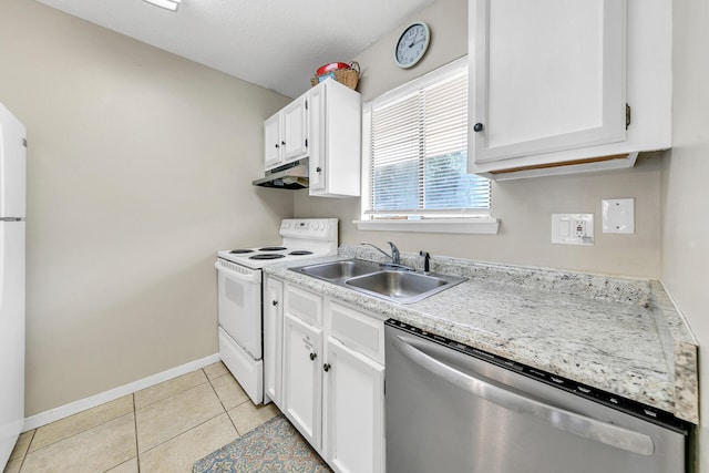kitchen with light tile patterned floors, sink, white cabinets, and white appliances