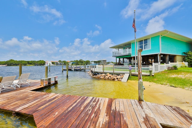 dock area featuring a water view