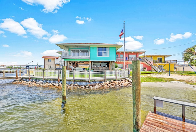 dock area with a water view