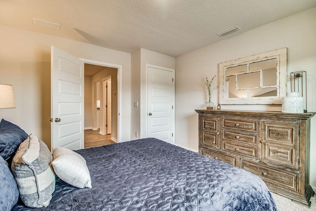 bedroom with a textured ceiling