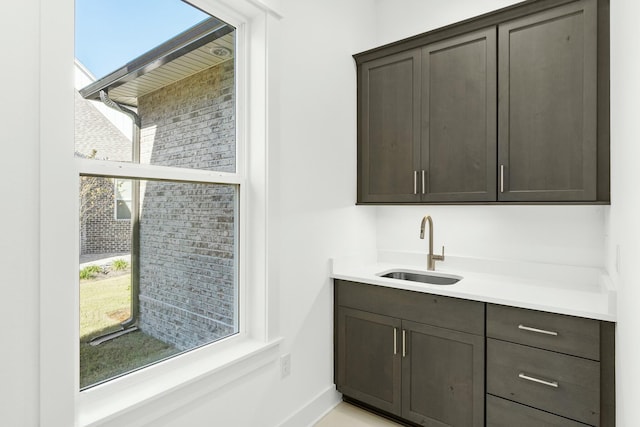 bathroom featuring vanity and a healthy amount of sunlight