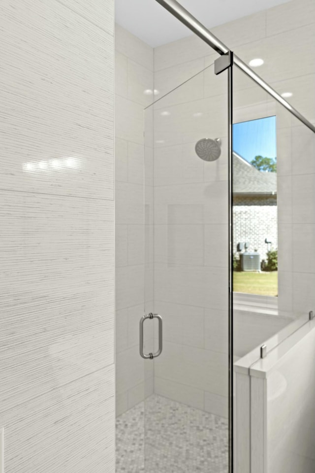 bathroom with walk in shower