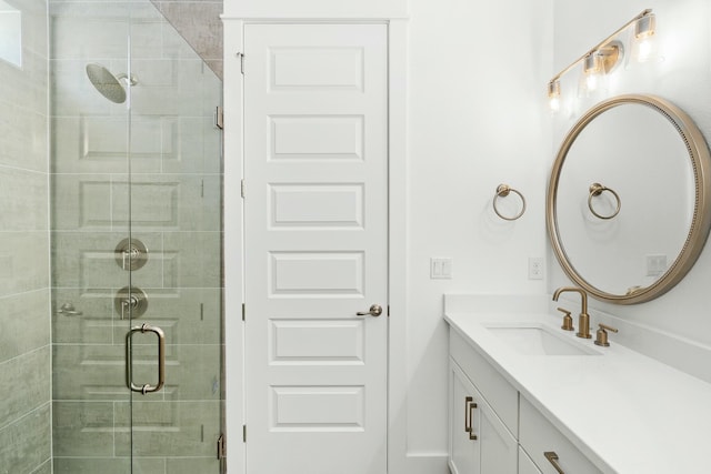 bathroom with vanity and walk in shower