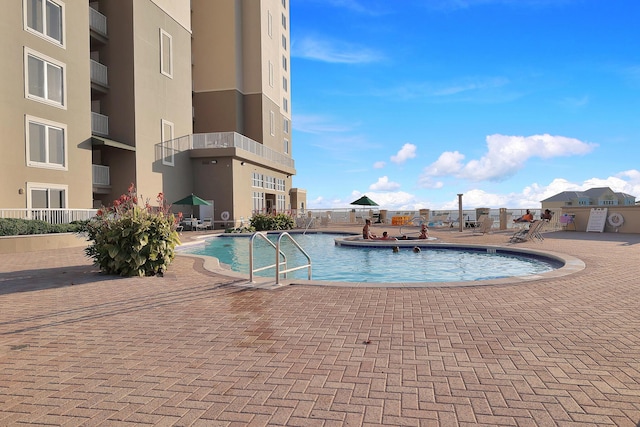 view of pool with a patio