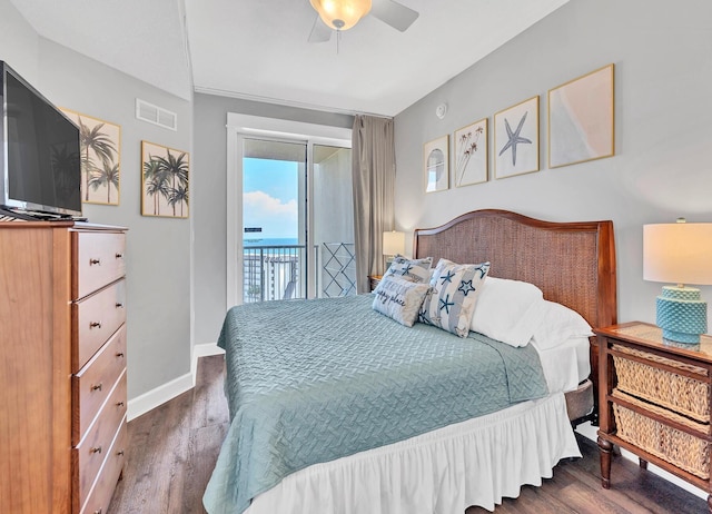 bedroom with dark hardwood / wood-style flooring, access to outside, and ceiling fan