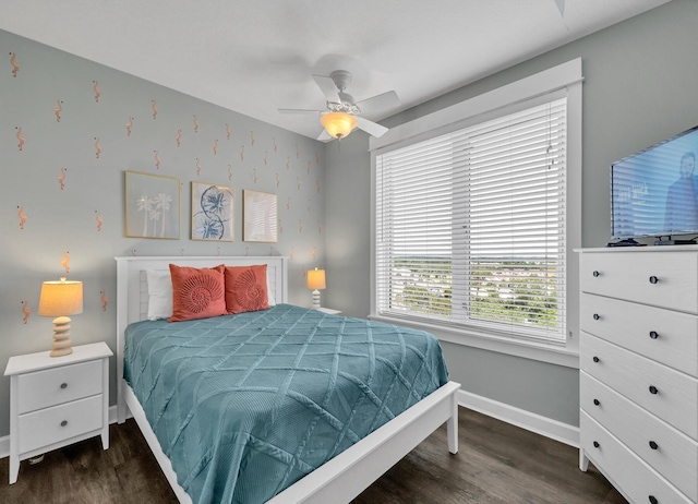 bedroom featuring ceiling fan and dark hardwood / wood-style floors