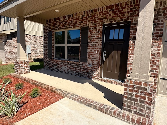 property entrance featuring a porch