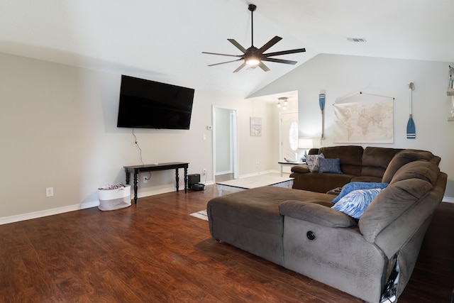 living room with dark hardwood / wood-style floors, ceiling fan, and vaulted ceiling