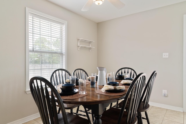 tiled dining space with ceiling fan