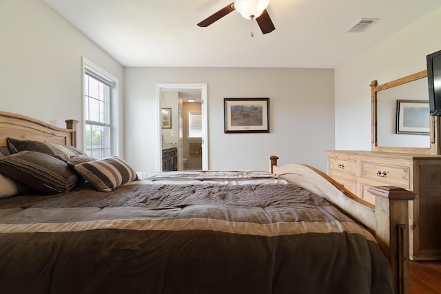 bedroom with connected bathroom and ceiling fan