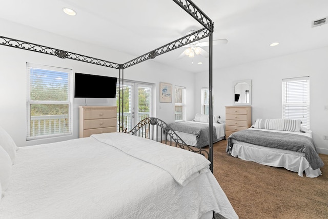 bedroom featuring carpet floors, ceiling fan, and access to outside