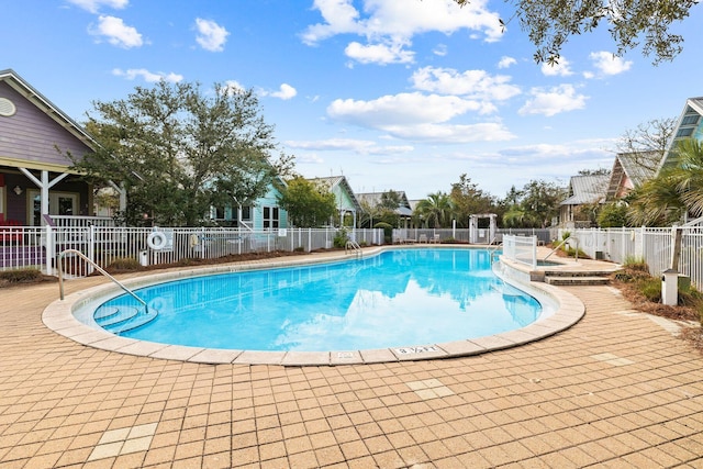 view of pool featuring a patio area