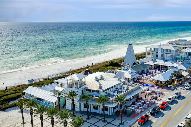 bird's eye view with a beach view and a water view