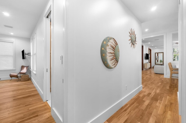 hallway featuring light wood-type flooring