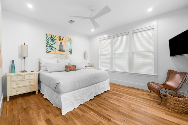 bedroom featuring ceiling fan and light hardwood / wood-style floors