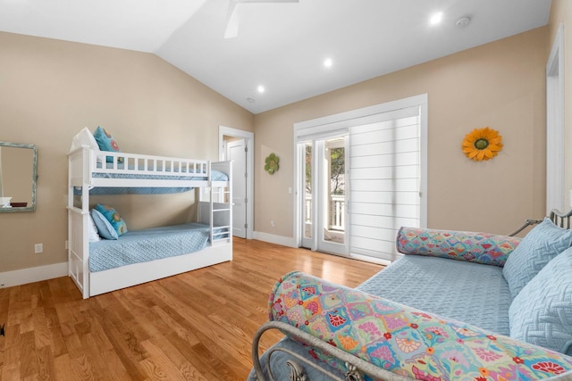 bedroom featuring access to outside, ceiling fan, vaulted ceiling, and light hardwood / wood-style floors