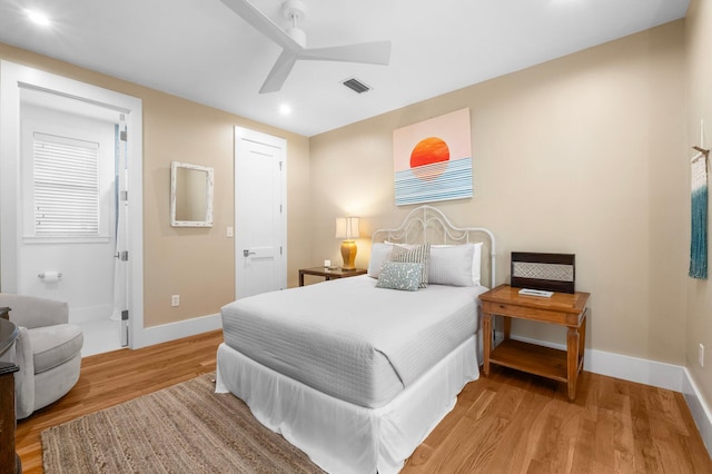 bedroom with ceiling fan and light hardwood / wood-style floors