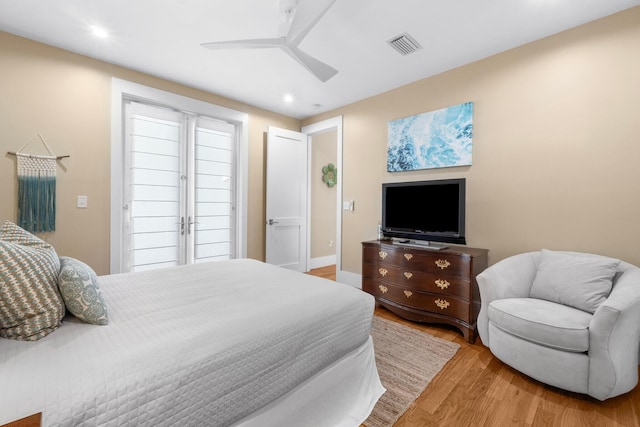 bedroom featuring ceiling fan and light wood-type flooring