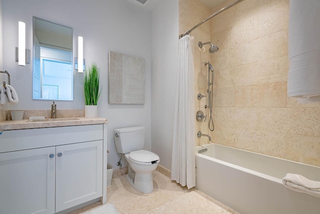 full bathroom with oversized vanity, toilet, and shower / tub combo