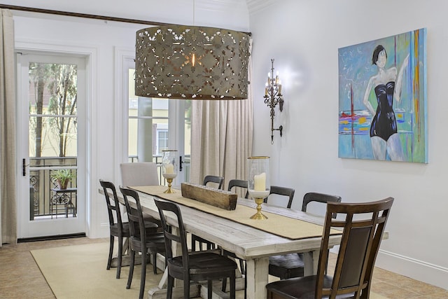 dining area featuring ornamental molding