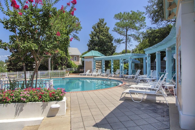 view of pool featuring a pergola and a patio area