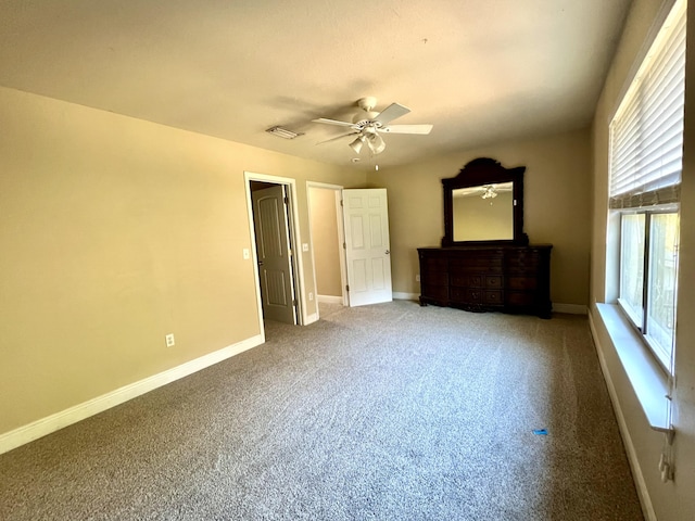 unfurnished bedroom with carpet flooring and ceiling fan