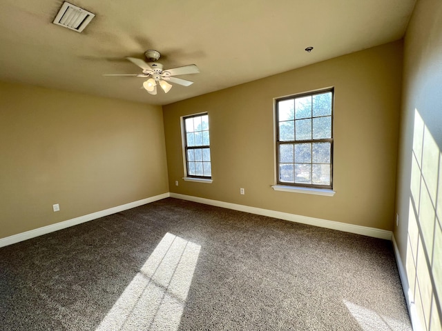 unfurnished room featuring carpet floors and ceiling fan