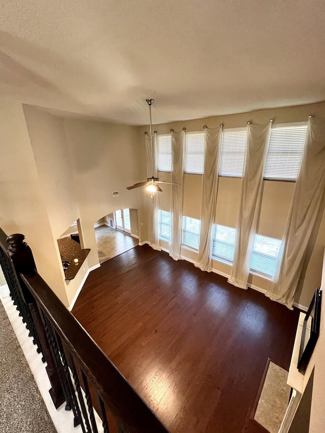 interior space with hardwood / wood-style flooring, plenty of natural light, and ceiling fan