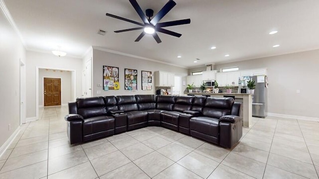 tiled living room with ceiling fan and ornamental molding