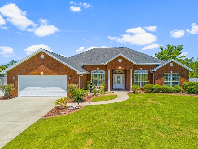 ranch-style home with a garage and a front lawn