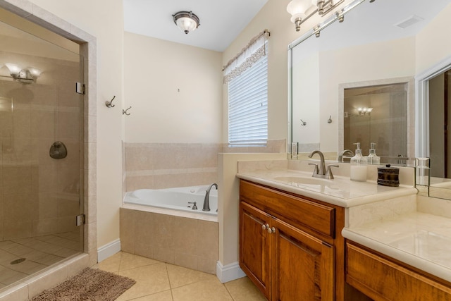 bathroom with tile patterned flooring, vanity, and independent shower and bath