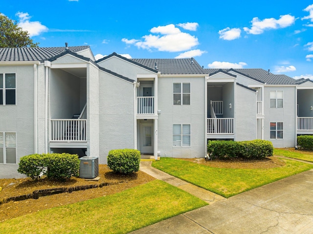 view of property with central AC unit