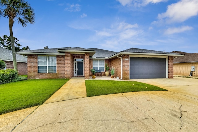 view of front facade featuring a garage and a front lawn