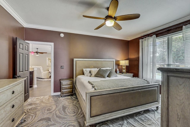 bedroom with multiple windows, ceiling fan, and crown molding