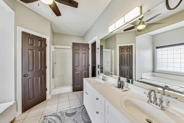 bathroom with plus walk in shower, vanity, and tile patterned floors